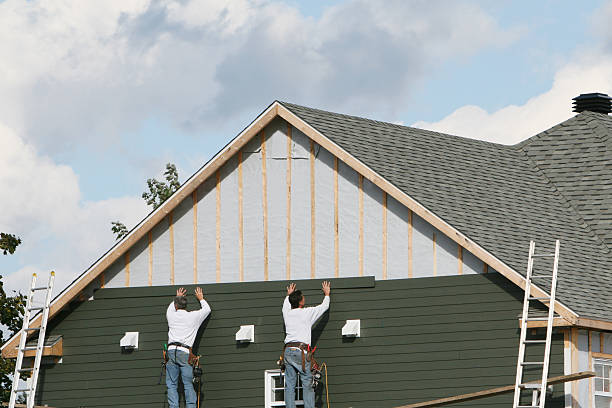 Professional Siding technician working in Newton Highlands, MA